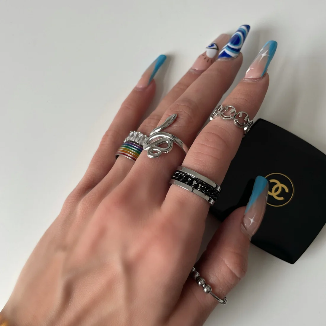 Finger tip rotating chain ring beer opening ring