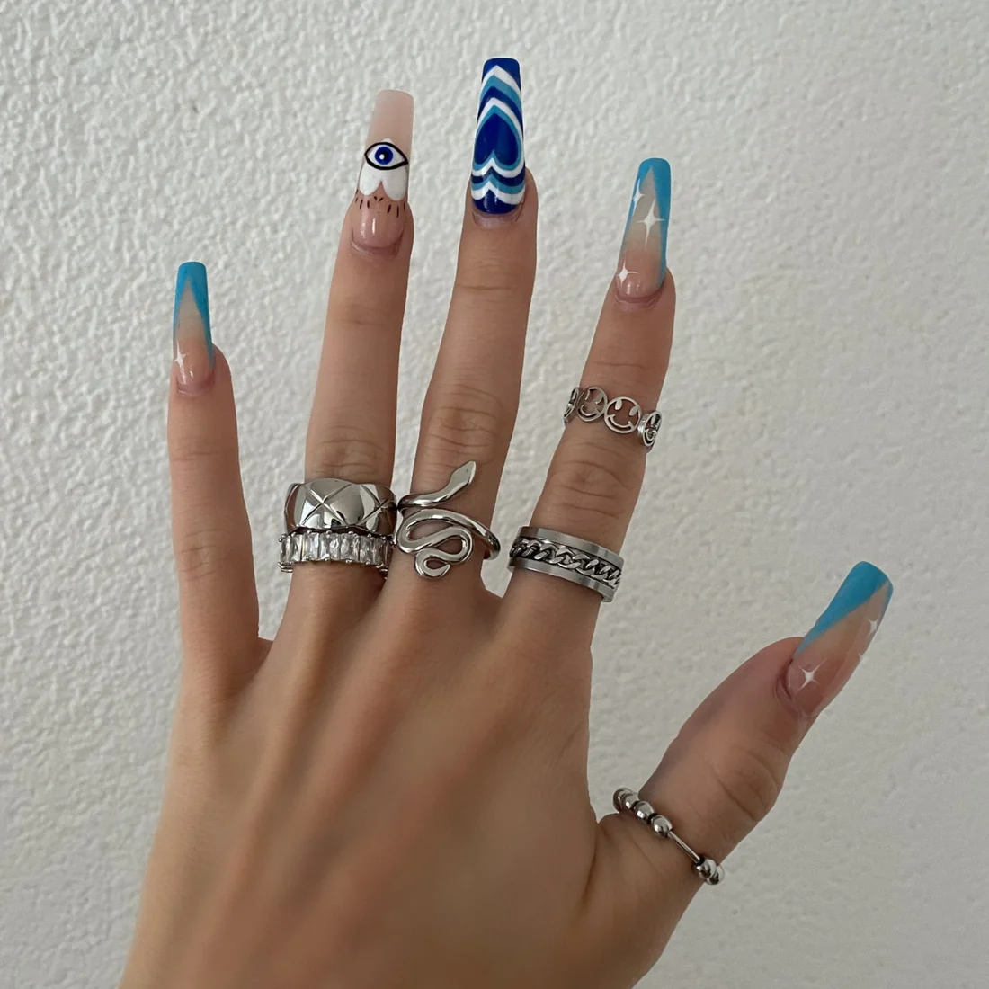 Finger tip rotating chain ring beer opening ring